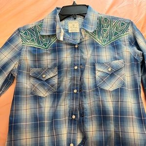 Embroidered panhandle pearl snap show shirt.